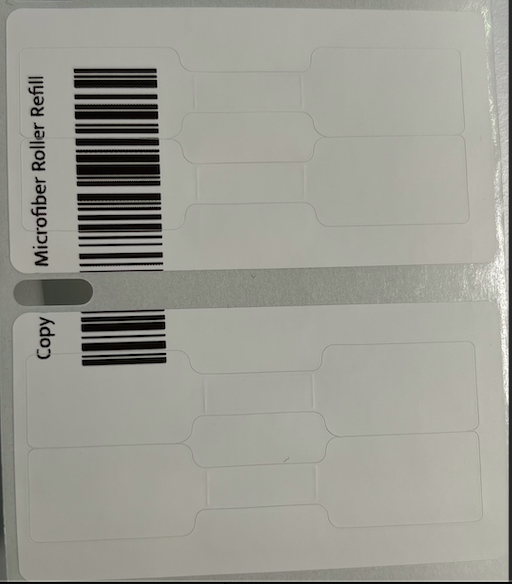 Roll label output where the printed content is cut off or misaligned against the label edge