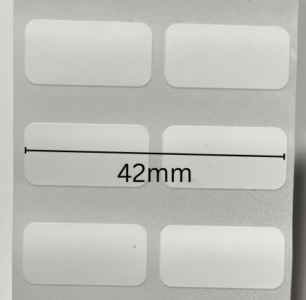 Original label-stock photo showing a 42mm width across the two columns